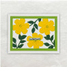 Een gestanst frame gevuld met gele bloemen en groene blaadjes.