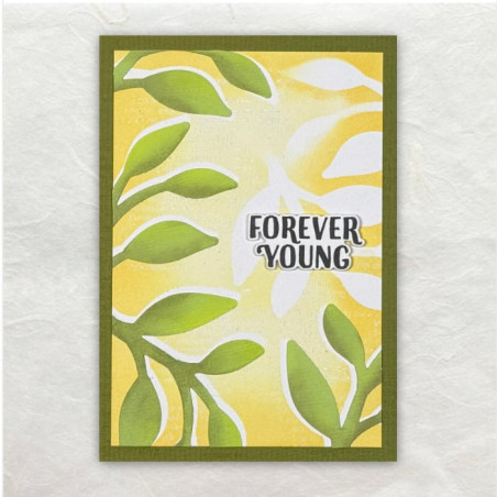 Gesjabloneerde bloembakjes met een schaduweffect in frisse geel groene tinten. De tekst Forever Young is duidelijk.