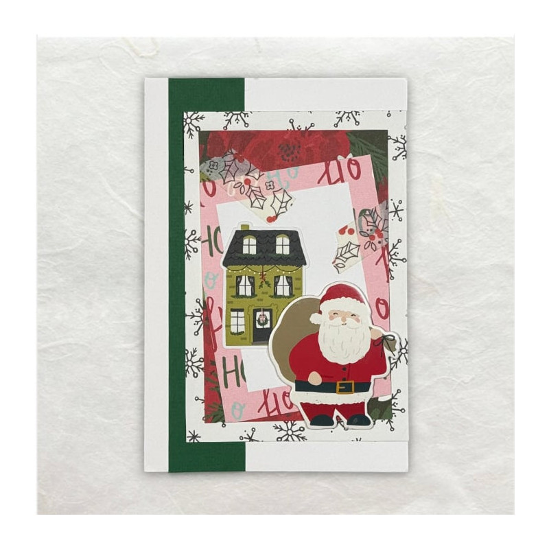Verschillend designpapier, een sticker van een kersthuis en een chipboard van de kerstman maken deze kerstkaart compleet.