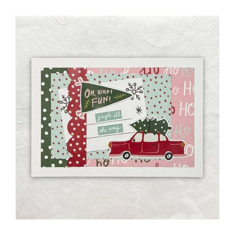 Als je Designpapier van Kerst plakt op een kaart samen met wat stickers, dan krijg je mooie Kerstkaart.