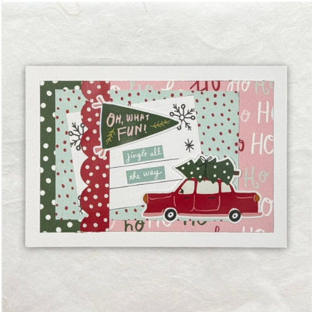 Als je Designpapier van Kerst plakt op een kaart samen met wat stickers, dan krijg je mooie Kerstkaart.