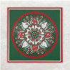 De Mandala is meerdere keren gestanst uit designpapier en in de oorspronkelijke vorm teruggelegd en vastgeplakt.