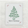Deze kerstboom met versieringen is uitgesneden met de Cricut.  De tekst is eveneens door deze machine geschreven.