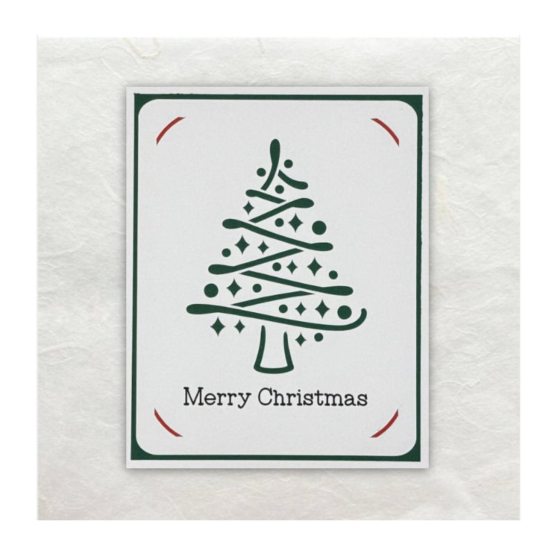 Deze kerstboom is met versiering en al uitgesneden met de Cricut Maker.
