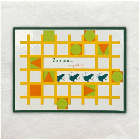 Het frame is uitgesneden met de Cricut en ingelegd met geometrische figuren. De tekst is met de handprinter geprint.
