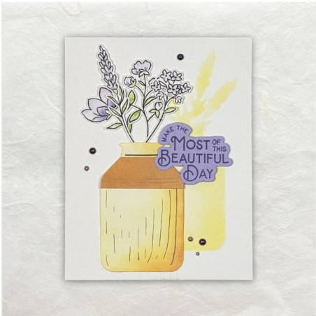De vaas is gestanst, evenals de bloemen. Op de achtergrond is de schaduw gesjabloneerd met de negatieve vormen.